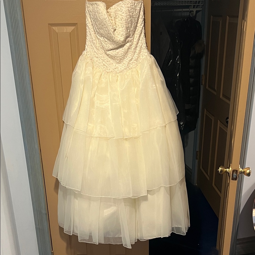 Elegant Cream young adult ball gown . Gorgeous fabric with crinoline underneath